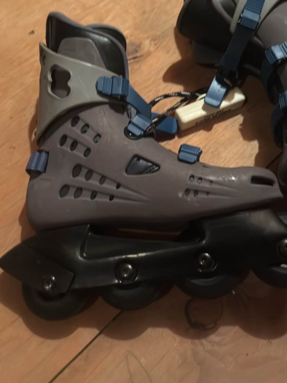 Gray Inline Roller Skates with Blue Straps